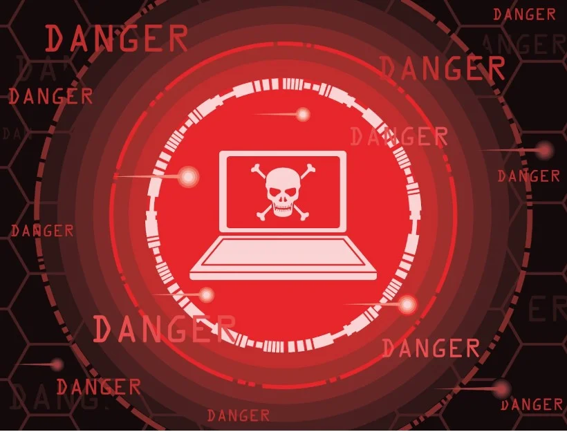Illustration showing a cyber threat warning on a laptop, symbolizing how can you prevent viruses and malicious code by recognizing digital dangers
