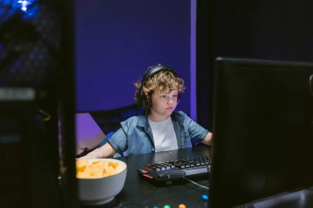 child playing a game on the computer