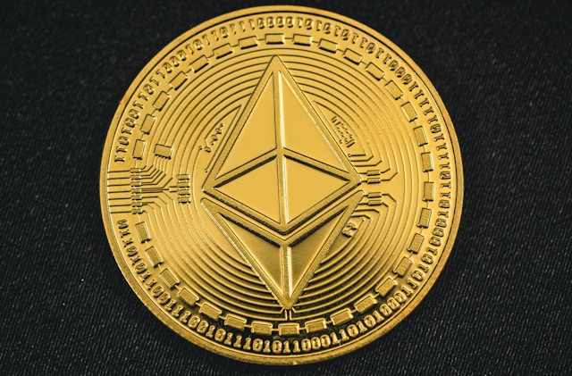 Close-up of a golden Ethereum coin showing digital circuit details, symbolizing cryptocurrency and blockchain technology