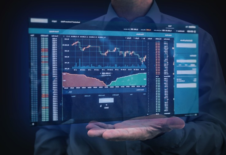 Man holding a holographic screen showing an institutional trading platform with crypto charts and market data